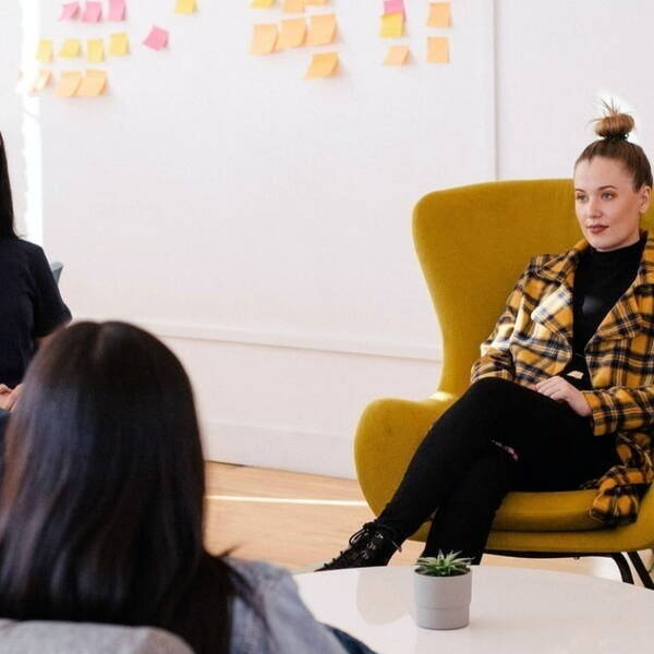 Office Worker in Yellow Chair