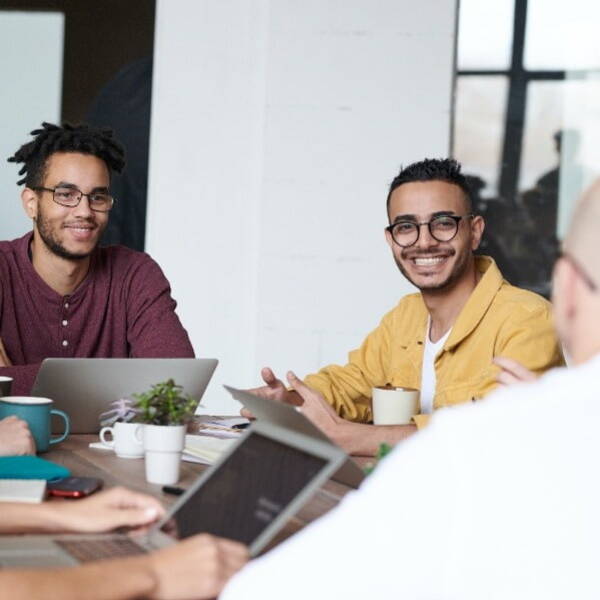 Happy people in a team meeting